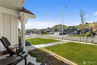 Lovely Front Porch to Watch the Worl Go By