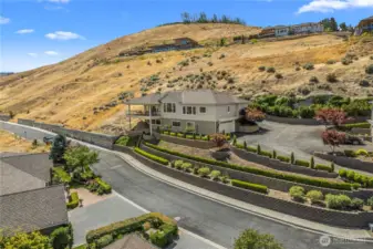 Lots of Space inside and out! 2 garages; lower and upper.