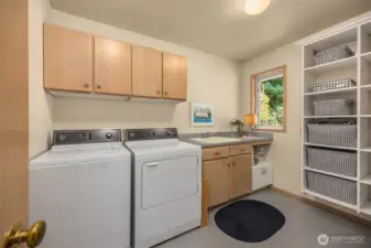 Main floor laundry. The home also has a main floor office!