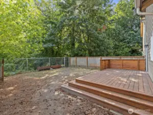 View from gate. Property goes beyond fence in back