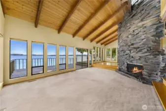 Looking toward the dining room and the classic 1981 fireplace. There are 2 fireplaces in the home - this one has a gas insert.