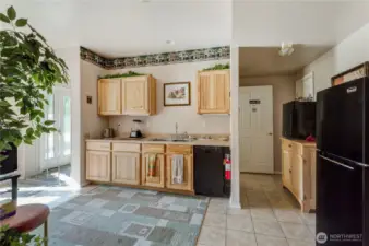 Secondary kitchen upstairs with lots of natural light