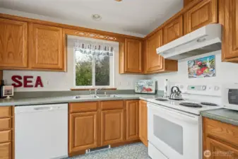 Nice sized kitchen with a brand new dishwasher.