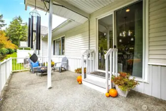 Through the dining room sliding door, you can step out to a wonderful covered patio overlooking the greenbelt.