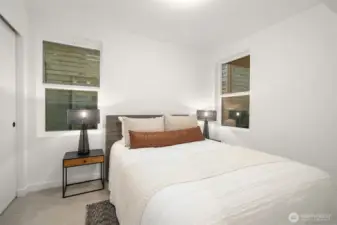 First level bedroom (staged with Queen size bed).