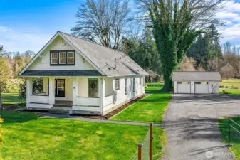 Security gate and newer gravel driveway