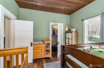 Bedroom with walk-in closet