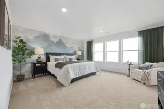 Relax and unwind in your spacious primary bedroom.  Pictures are for representational purposes only, colors and features may vary.
