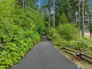 Private entrance set away from the road