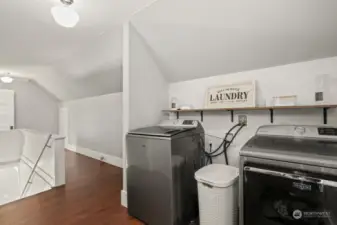 Laundry is conveniently located on upstairs landing.