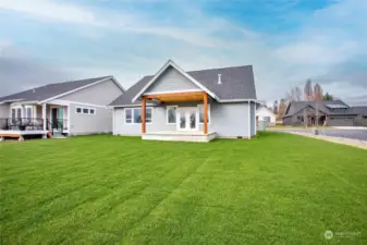 The covered back patio will be great for watching the sunrise and sunsets.