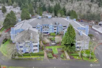 A bird’s-eye perspective of the well-maintained community, showcasing its lush greenery, modern architecture, and well-planned walkways.