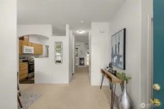 Formal dining with beautiful accent wall conveniently located next to the kitchen