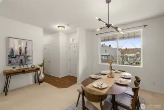 Formal dining with beautiful accent wall conveniently located next to the kitchen