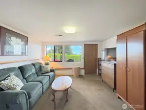 Sitting area in bedroom with access to backyard