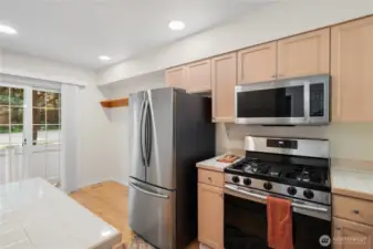 Kitchen facing eating area and patio