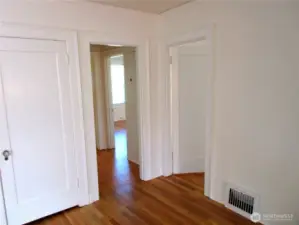 Hallway to back bedrooms and bathroom