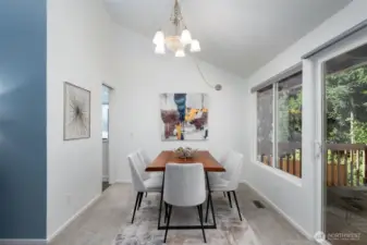 Dining room allows for easy indoor and outdoor access to the deck.
