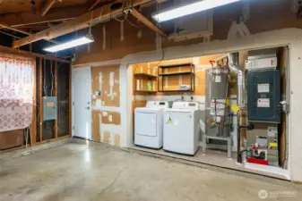 Washer and dryer are located in the garage.