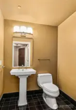 powder room and coat closet upon entry