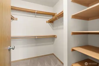 Large walk-in closet in primary bedroom.
