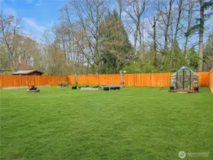 This fully fenced private back yard is a gardeners dream.