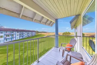 South-facing balcony captures the coastal light and ocean views—perfect for morning coffee or sunset unwinding.
