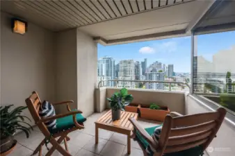 You can sit & soak in the incredible southwesterly views of the city's skyline, Mt. Rainier & the sound here.  The Olympic mountains are more easily viewed from the living area & primary suite.