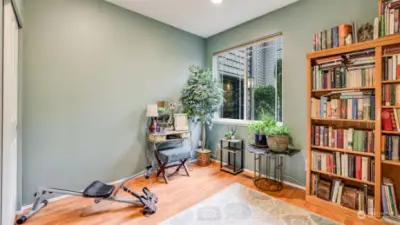 This is the 2nd bedroom, currently being used as a den.  Bright beautiful hardwoods.