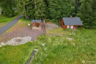 Fire pit and patio to enjoy while you are building your luxury custom home.