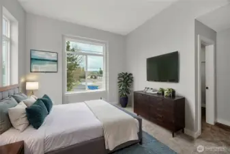 Bright and spacious primary bedroom - high ceilings (virtually staged)