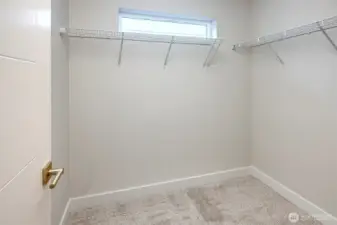 Large walk-in closet in primary bedroom