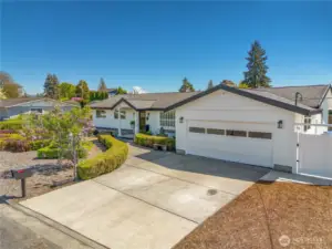 Views of Mt Rainier, Many updates throughout, newer roof, freshly painted exterior, professionally landscaped with English boxwoods and lilacs.