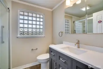 Main bath was remodeled with nice sized walk in shower and updated vanity.