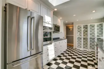 Kitchenaid appliances, electric stove top and wall oven.