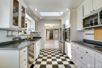 Light and bright kitchen faces the backyard and is adjoining to the family room.