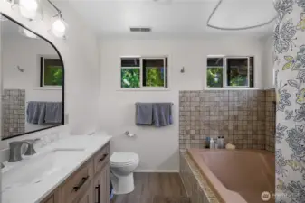 Updated bath! Stone counter and new vanity and floor.