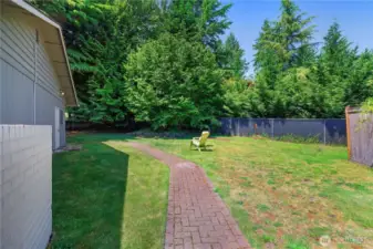 Side yard, path to the office.