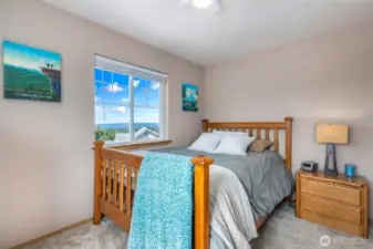 Bedroom 3 with view of the bay and Olympics.