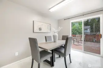 Dining space off kitchen w/ access to deck.