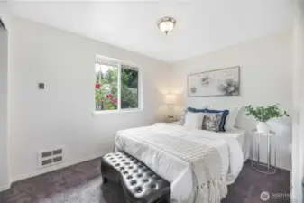 Additional bedrooms on opposite side of living room.
