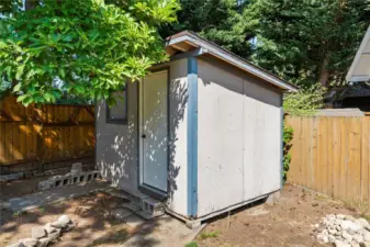 Close-up of the functional backyard shed—ideal for hobbies, storage, or a workshop setup.