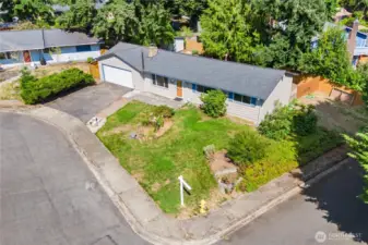 Bird’s-eye view of this desirable corner lot in a double cul-de-sac. The spacious 8,600 sq ft lot offers privacy, extra yard space, and a low-traffic street setting—perfect for quiet living in Des Moines’ highly sought-after North Hill neighborhood.