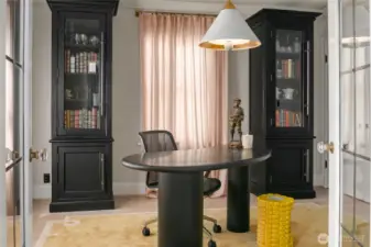 An alternate perspective of this flexible main floor bedroom with both western and northern exposure. The closet in this room is fully outfitted with shelving and more.
