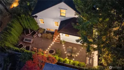 A breathtaking aerial captures the garden aglow—an enchanting blend of light, color, and greenery.