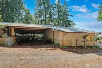 Garage with attached carport.