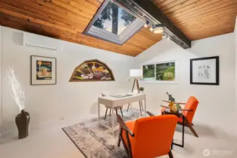 Now back to the main level we also have the office, custom stained glass, massive skylight.