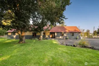 Private setting with asphalt driveway