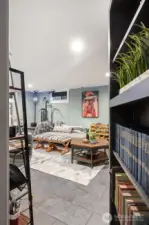 Basement - hidden behind the bookshelf is karaoke room