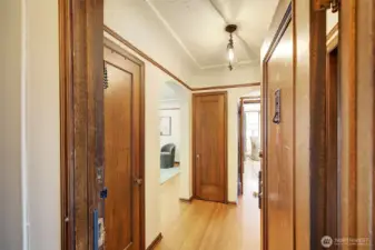 Lovely entry with lots of mahganoy trim and doors!